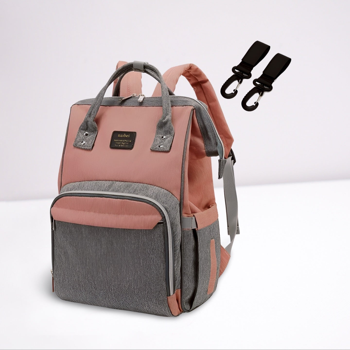 sac de voyage a dos a langer rose et gris