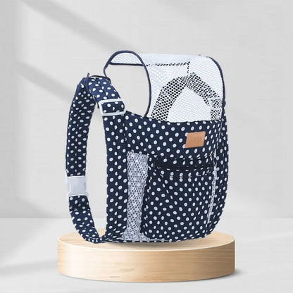 porte bebe bleu a boule blanche